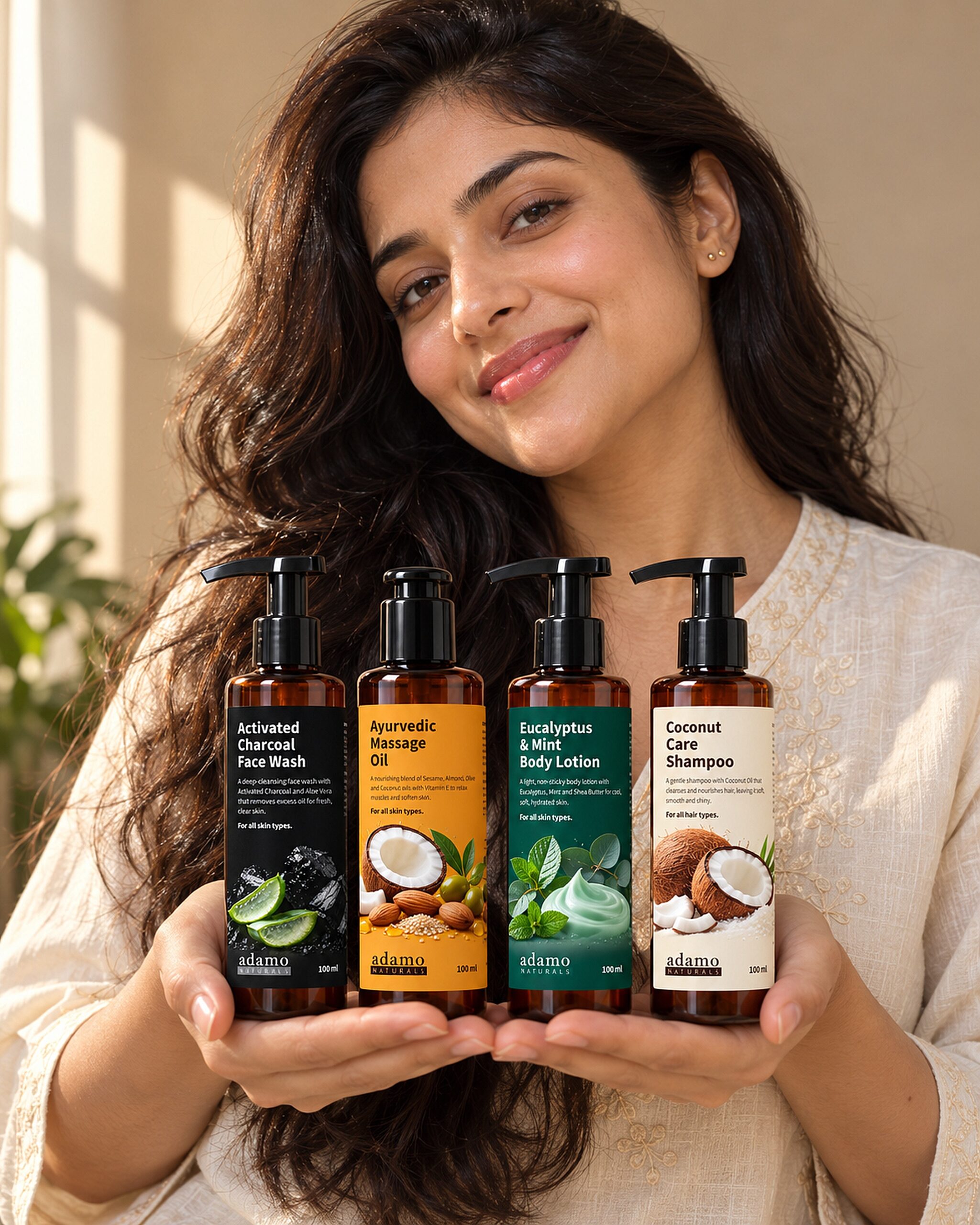 A woman holding the Adamo Naturals face, hair and body range