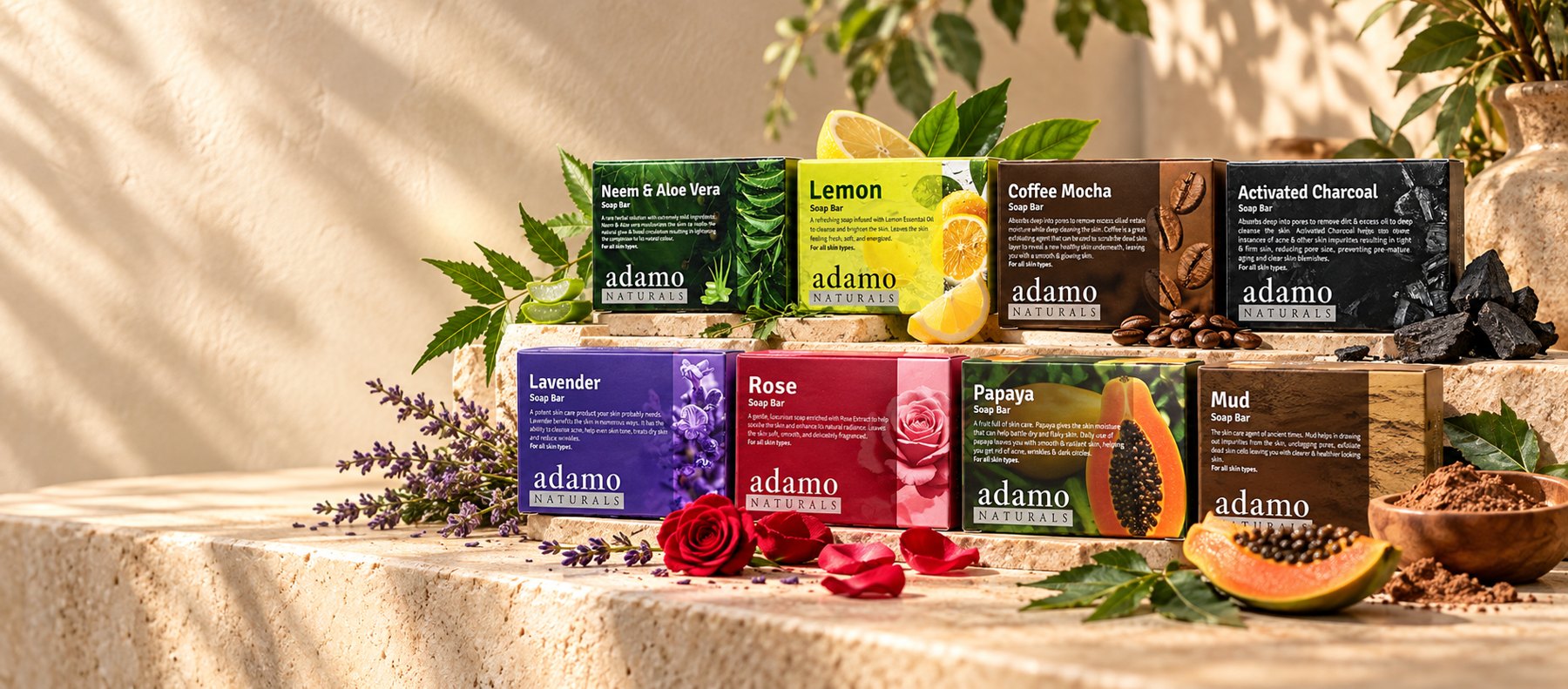Eight handmade Adamo Naturals soap bars: Neem and Aloe Vera, Lemon, Coffee Mocha, Activated Charcoal, Lavender, Rose, Papaya and Mud