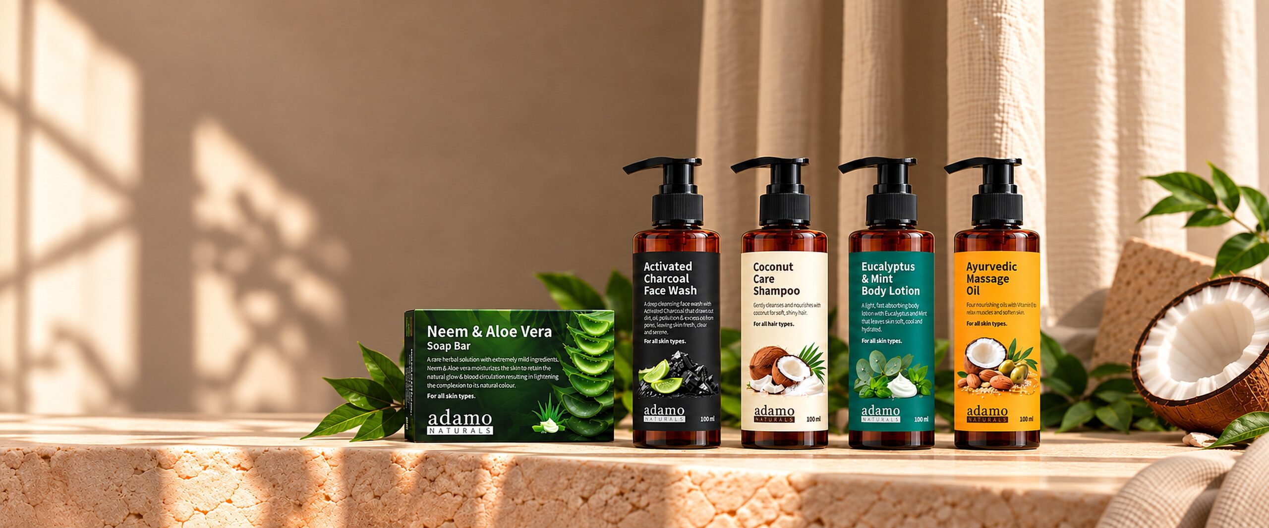 The Adamo Naturals soap, face wash, shampoo, body lotion and massage oil on a stone shelf