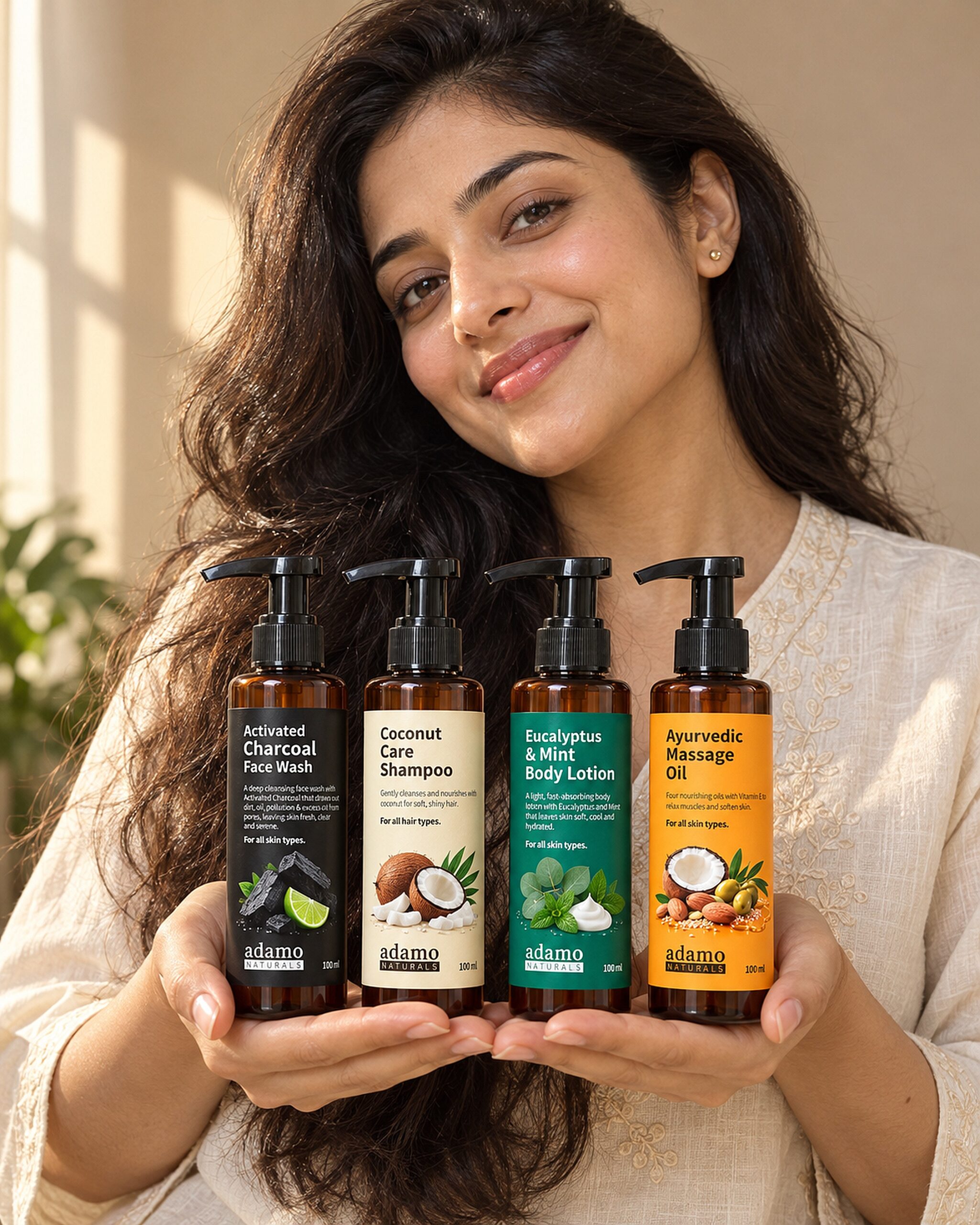 A woman holding the Adamo Naturals face, hair and body range