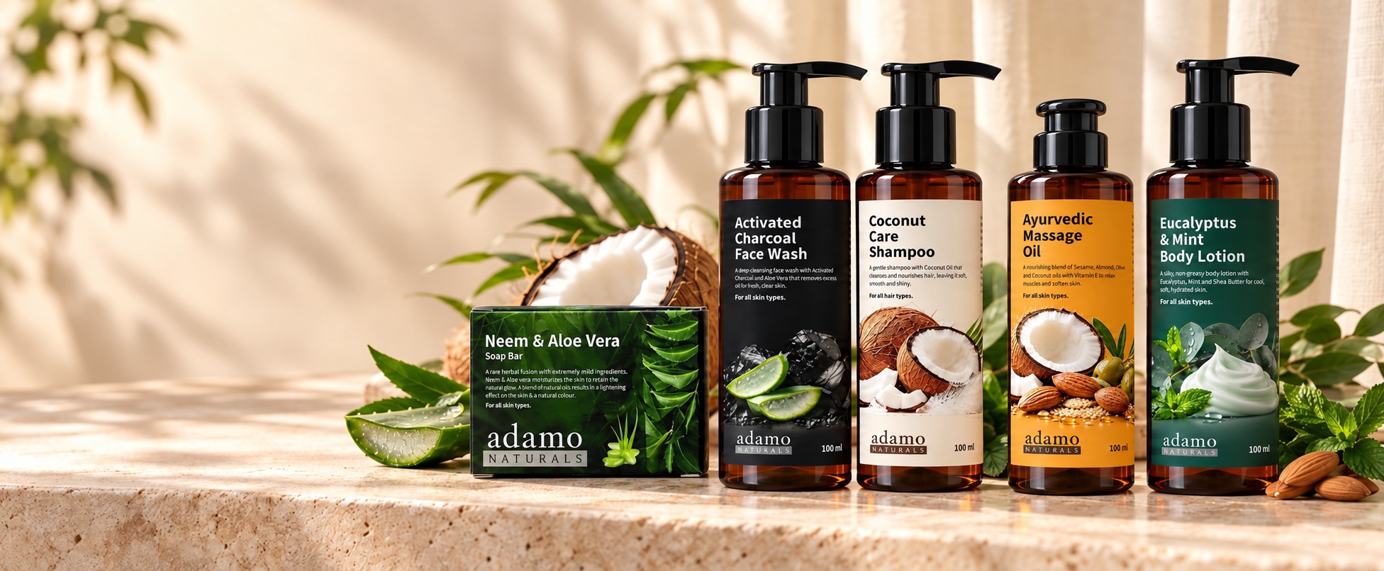 The Adamo Naturals soap, face wash, shampoo, body lotion and massage oil on a stone shelf